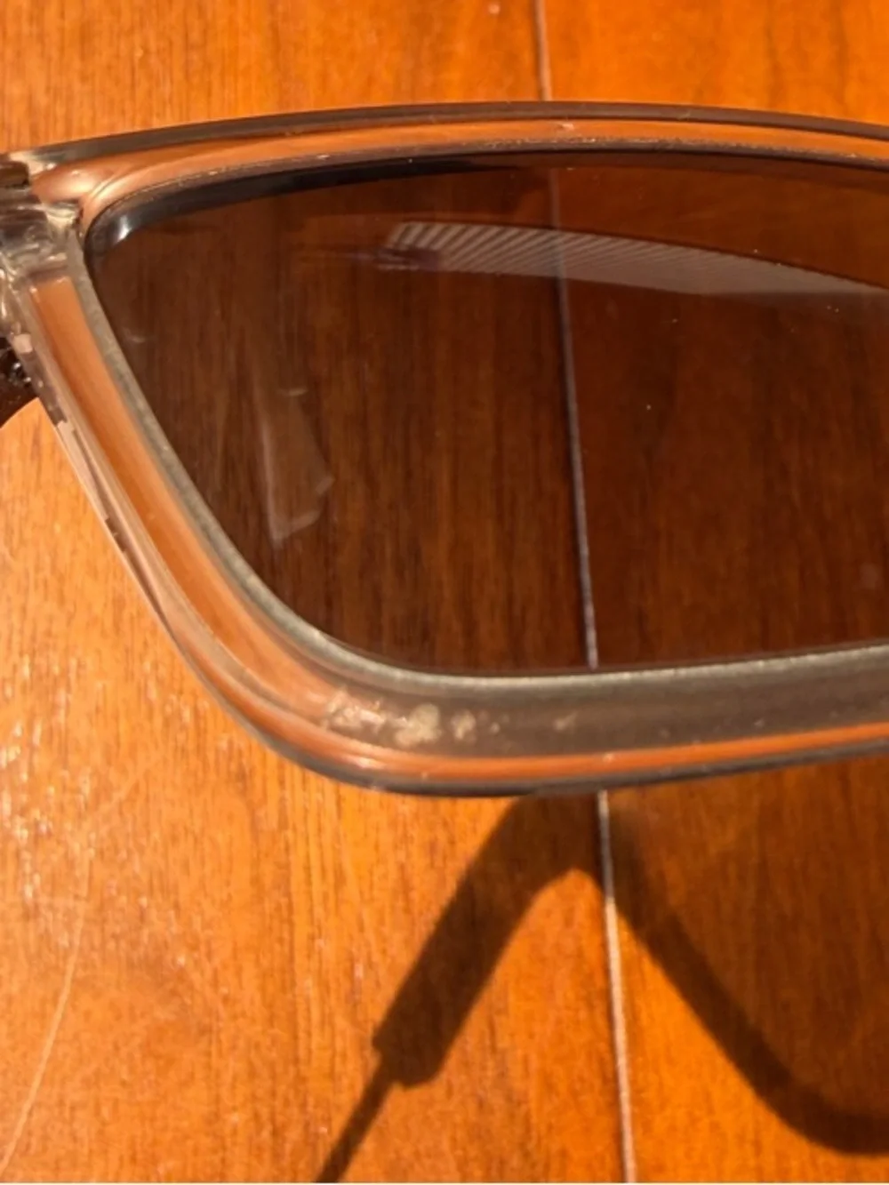 Prada Men’s Clear Frame Sunglasses with Dark Blue Lenses